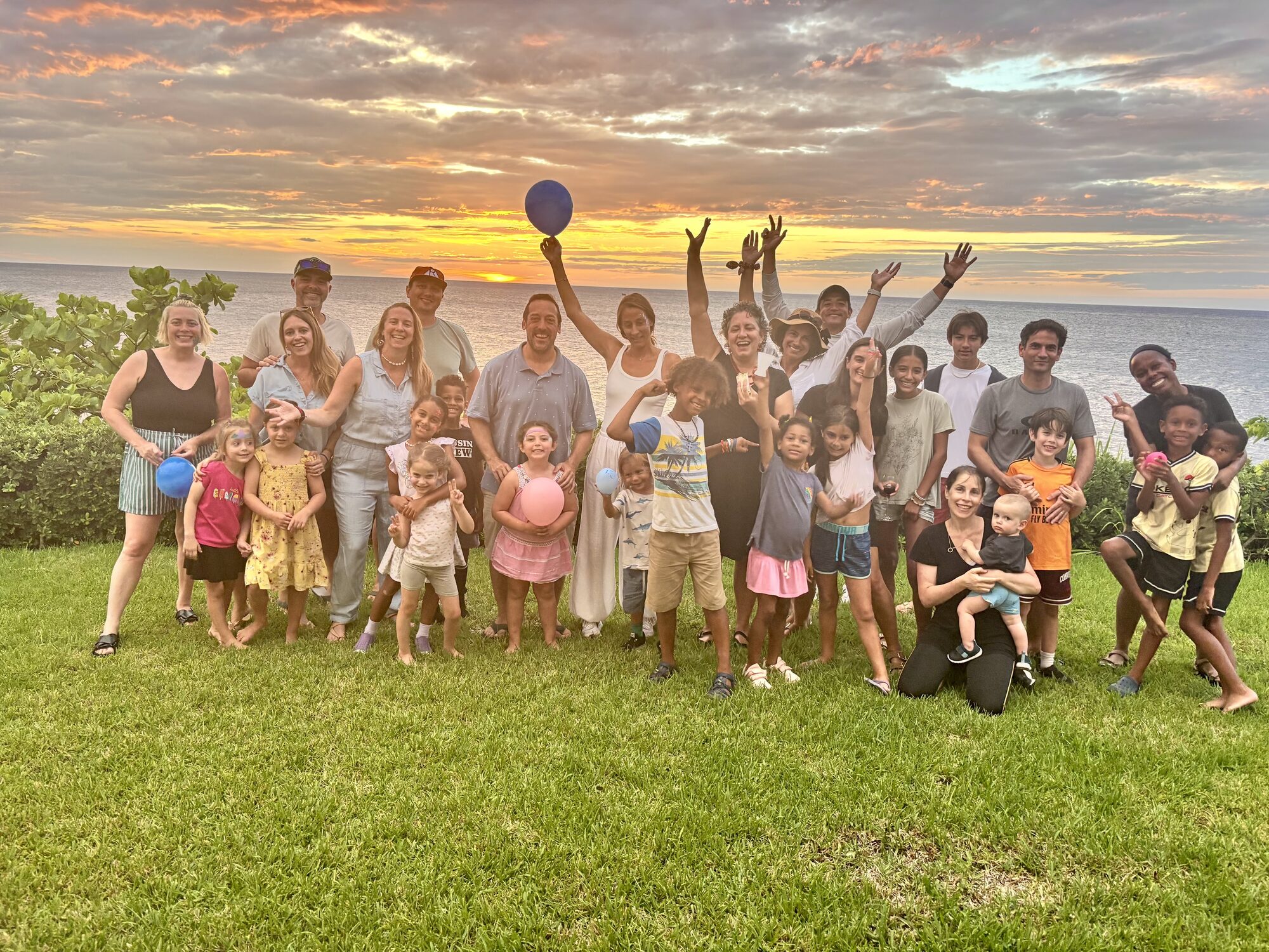 Nomad families gathered at sunset in Próspera
